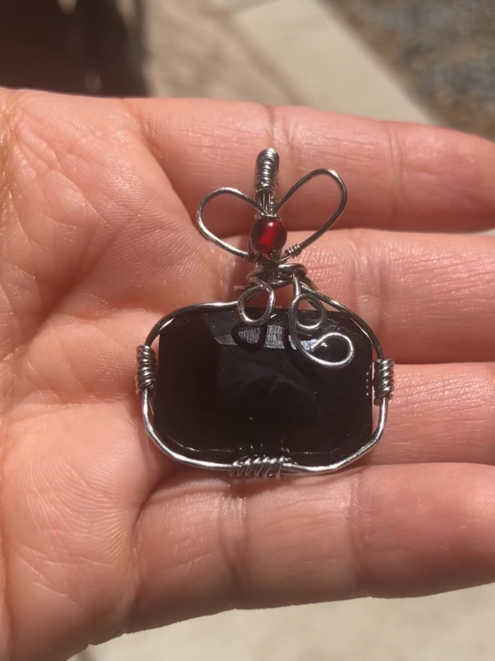 CZ Black Wire Wrapped Pendant with Garnet